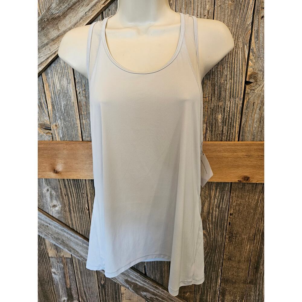 NWT Victoria's Secret sport vented ivory lightweight packable plates yoga run L